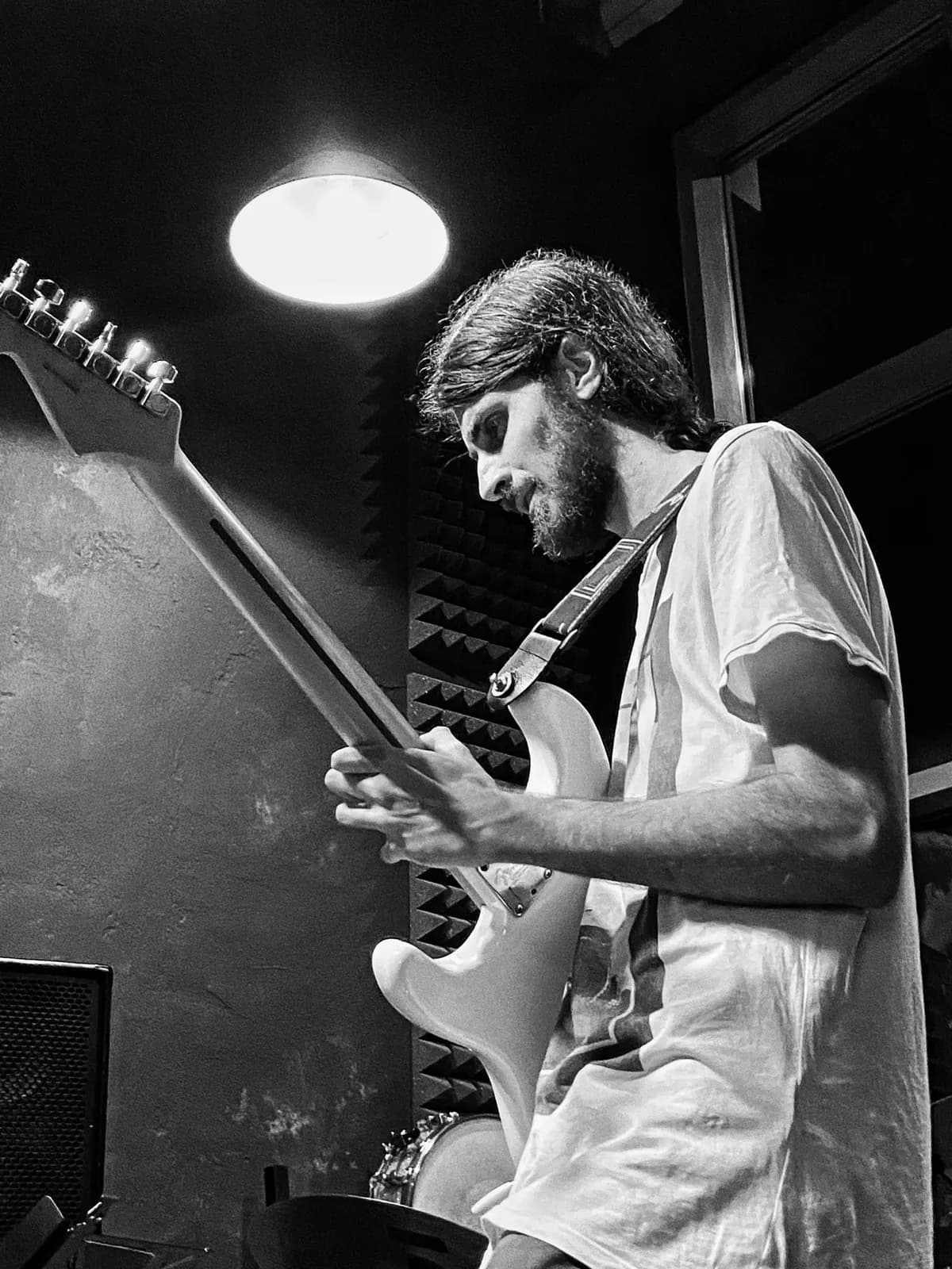 Black and white photograph of Warren Galea performing